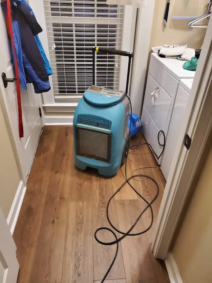 Commercial dehumidifier deployed for Flood Damage Cleanup in West Jordan